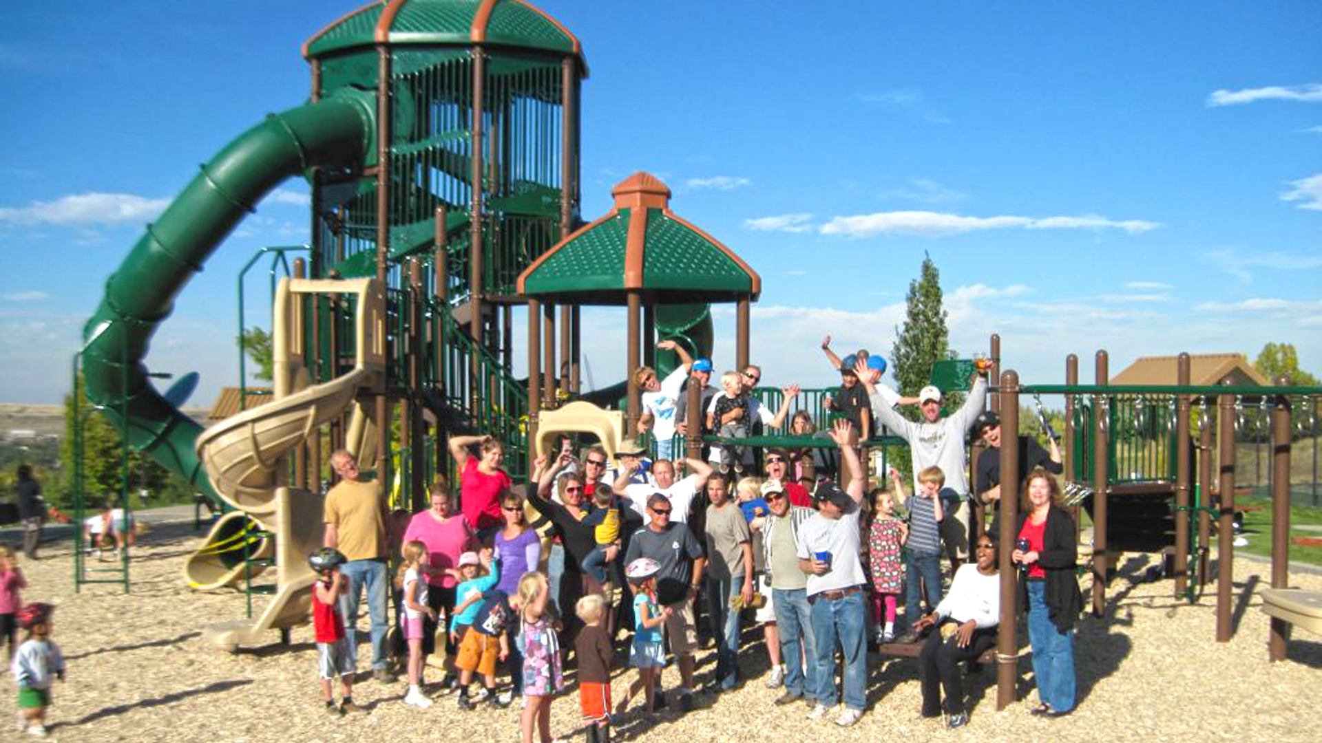 Group of residents at the playground in Estates Park.