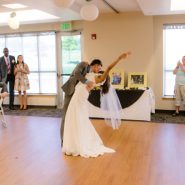 A bride and groom dancing at the reception
