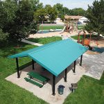 Playground features and park shelter at Blue Heron Park