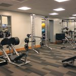 Several different pieces of weight lifting equipment in the cardio weight room in Lilley Gulch Recreation Center.