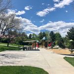 View of playground, shelter and basketball court at Dewy Haberman Park