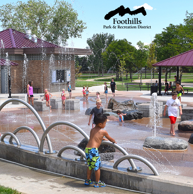 Children playing in different splash features at the Splash Park in Clement Park
