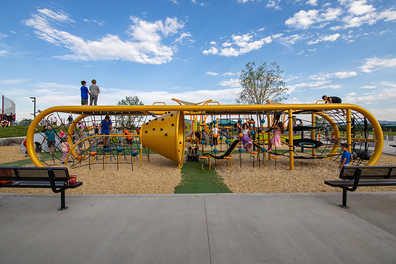 Trombone shaped climbing and play feature feature in the Inclusive Playground in Clement Park