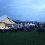 Grant Family Amphitheater at dusk during a theater performance in Clement Park