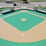 Overhead drone image of the cushioned, rubberized turf field replacement for adaptive baseball play.