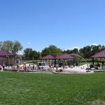 Full view of the Splash Park in Clement Park with varied water features and four park shelters
