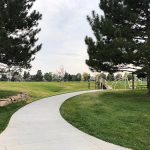 Sidewalk view leading to the playground and park shelter in Valley View Park.