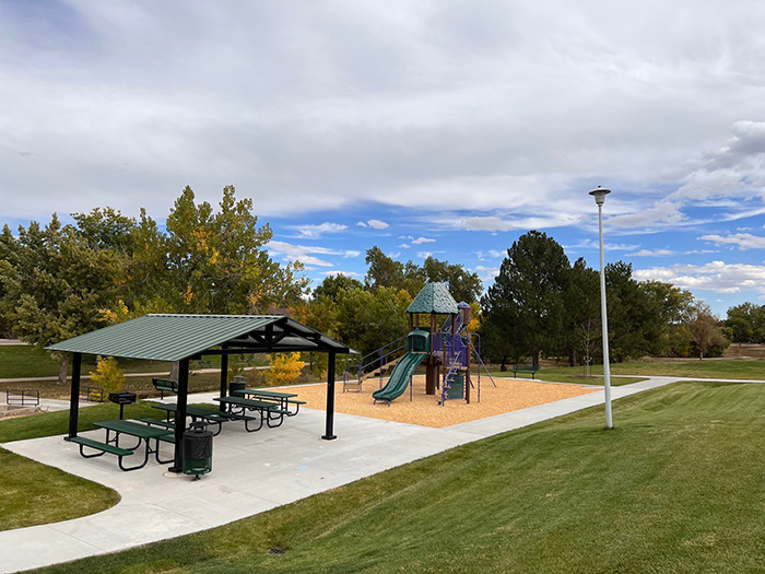 View of picnic shelter and playground in Woodmar Square Park.