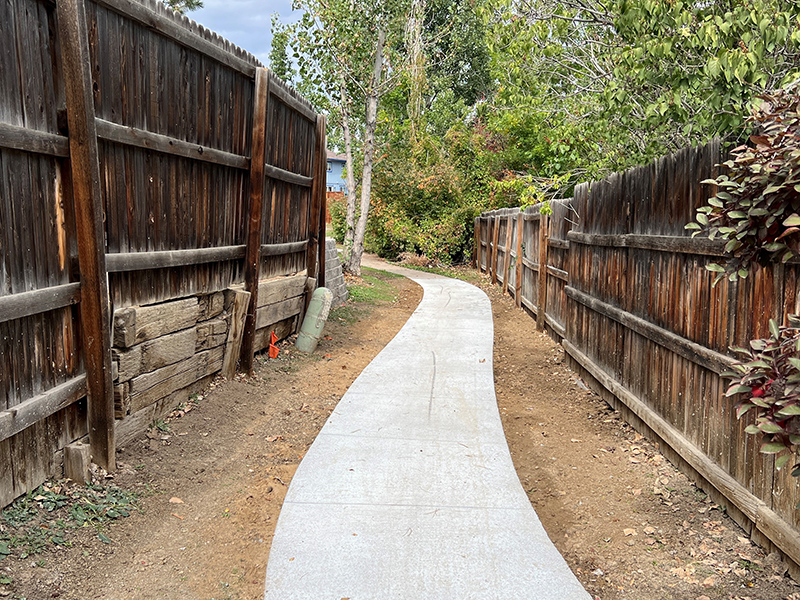 New sidewalks poured to replace damaged walkways.