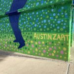 Close up of artist's signature on wall reading AUSTINZART