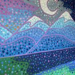Close up of the artwork displaying a portion of the moon above the mountains with several different colored dots creating the overall image.