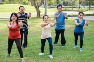 People doing Tai Chi in the park