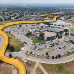 Aerial shot of Dutch Creek Trail highlighting the trail with a yellow line leading from the Ridge Recreation Center east to Kipling Parkway.