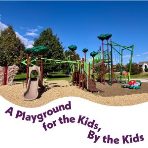 The new playground at Mossbrucker park with text that reads "A Playground for the Kids, By the Kids".
